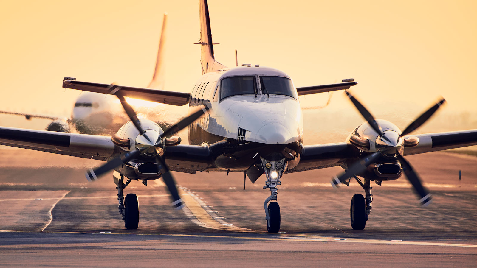 traffic-at-airport-during-sunset-2023-11-27-04-50-56-utc